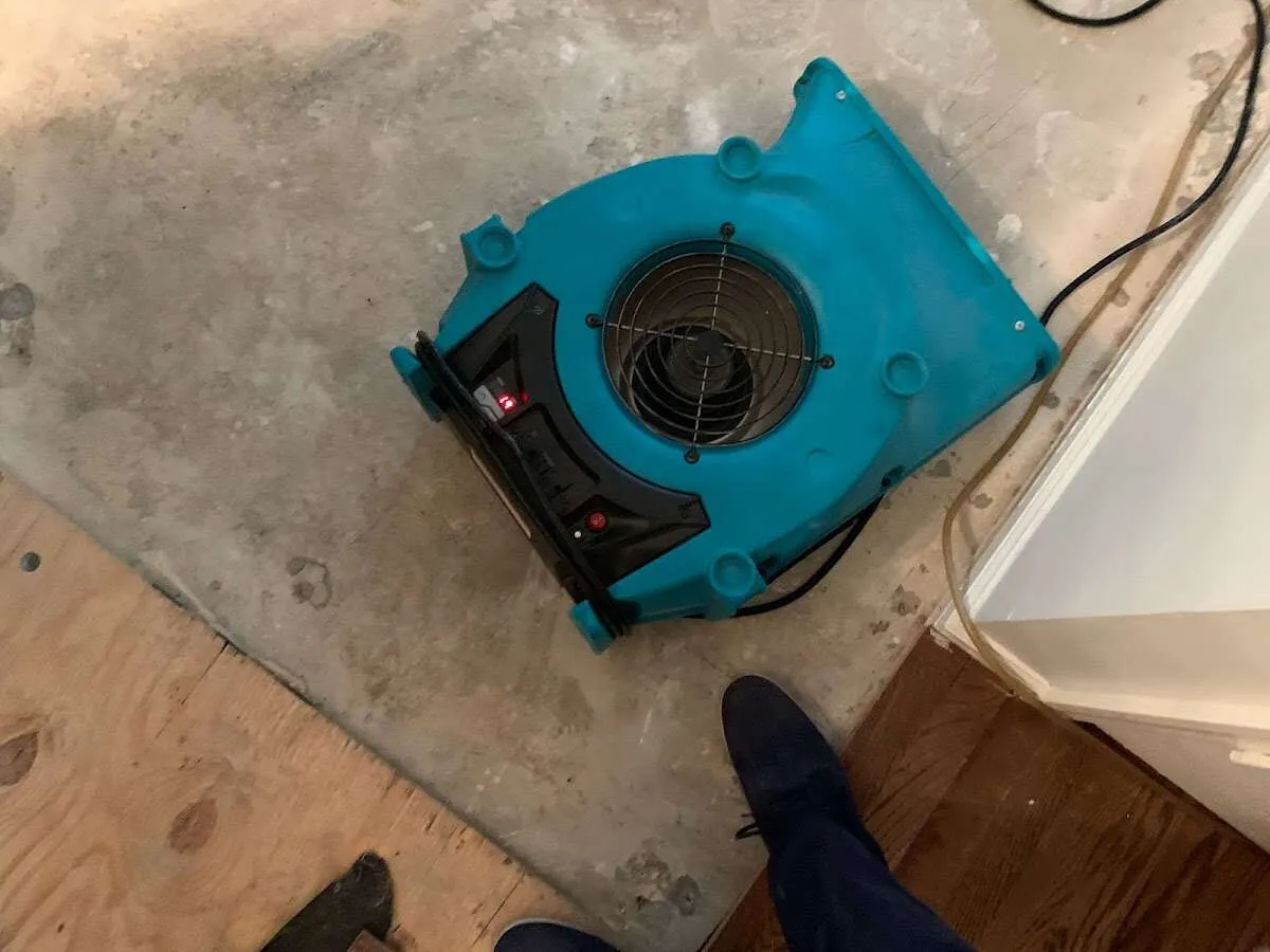 Air mover drying subfloor during Leak Detection & Repair in Fortuna Foothills